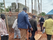 District Heads touring the Ward under construction at Buyobe HCIl